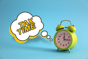  An image of a alarm clock ringing emphasizing the idea of tax filing for content creators